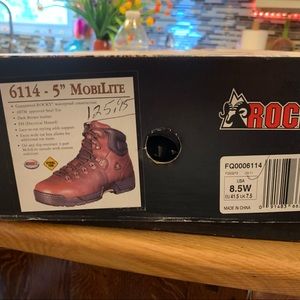 Mens Rocky steel toed boots. Brand new have never been out of box.